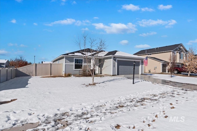 single story home with a garage