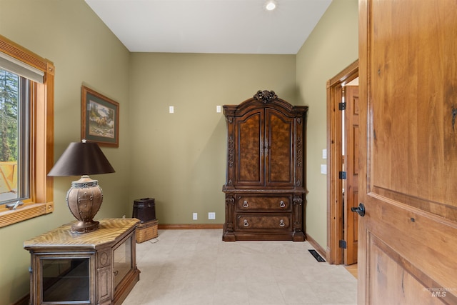 sitting room featuring baseboards