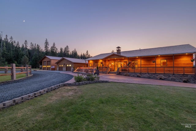 view of front of house with driveway and a garage