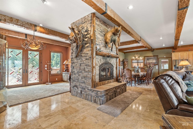 living area featuring a chandelier, a stone fireplace, beam ceiling, recessed lighting, and baseboards