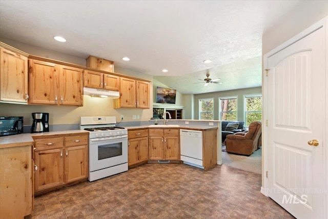 104 Sky Ridge Dr, Garden Valley, ID 83622 - kitchen with white appliances, under cabinet range hood, a peninsula, open floor plan, and light countertops