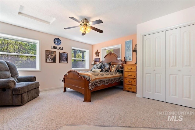 104 Sky Ridge Dr, Garden Valley, ID 83622 - carpeted bedroom featuring a closet, baseboards, and a ceiling fan
