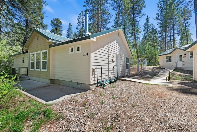 104 Sky Ridge Dr, Garden Valley, ID 83622 - view of home's exterior featuring a patio