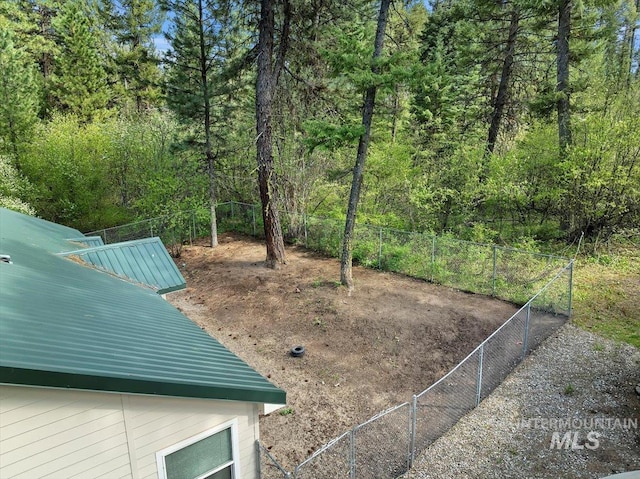 104 Sky Ridge Dr, Garden Valley, ID 83622 - view of yard with fence and a wooded view