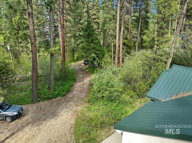 104 Sky Ridge Dr, Garden Valley, ID 83622 - view of street with a forest view