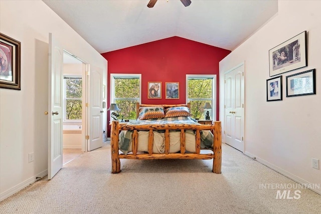 104 Sky Ridge Dr, Garden Valley, ID 83622 - carpeted bedroom with lofted ceiling, ensuite bath, baseboards, and ceiling fan