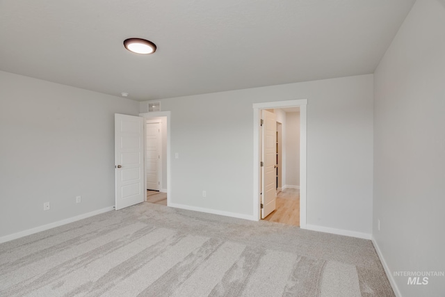 7417 E Shields Dr, Nampa, ID 83687 - unfurnished bedroom featuring baseboards and light colored carpet