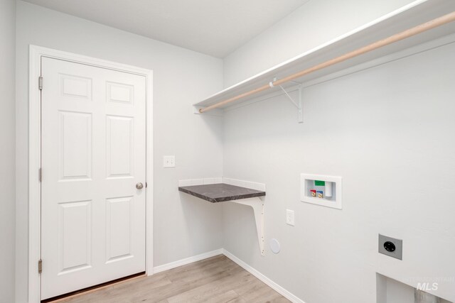 7417 E Shields Dr, Nampa, ID 83687 - clothes washing area featuring light wood finished floors, baseboards, laundry area, hookup for a washing machine, and hookup for an electric dryer