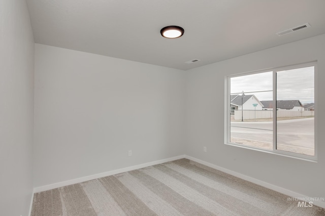 7417 E Shields Dr, Nampa, ID 83687 - carpeted spare room with baseboards and visible vents