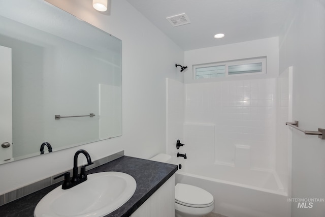 7417 E Shields Dr, Nampa, ID 83687 - bathroom with visible vents, toilet, vanity, and shower / bathing tub combination