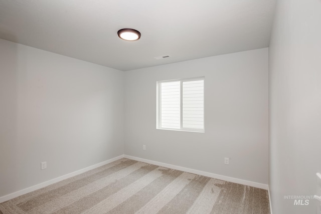 7417 E Shields Dr, Nampa, ID 83687 - spare room featuring visible vents, baseboards, and carpet floors
