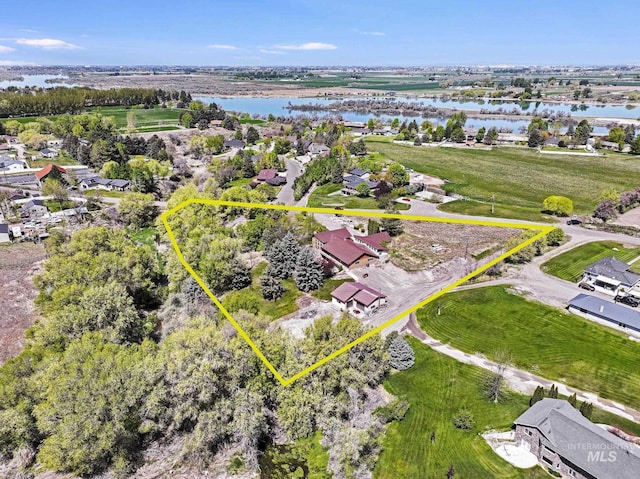 569 Spring Creek Rd, Burley, ID 83318 - aerial view of residential area with a nearby body of water and property boundaries highlighted