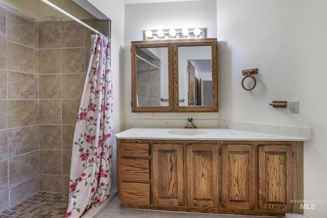 569 Spring Creek Rd, Burley, ID 83318 - bathroom featuring tiled shower and vanity