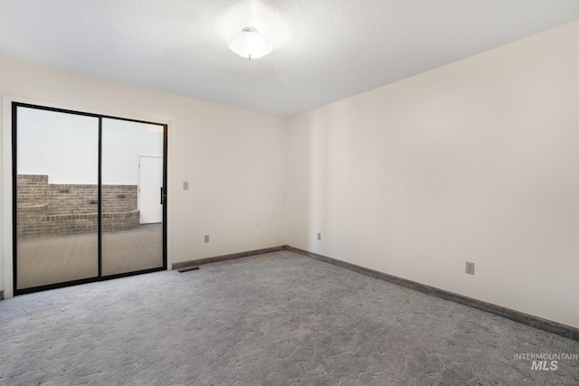 569 Spring Creek Rd, Burley, ID 83318 - carpeted empty room featuring baseboards