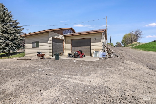 569 Spring Creek Rd, Burley, ID 83318 - view of property exterior with a garage and an outdoor structure