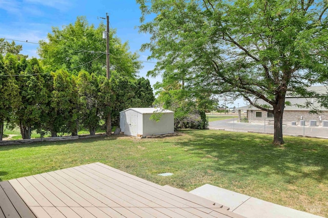 230 Sage St, Kimberly, ID 83341 - wooden deck featuring a storage unit and a lawn