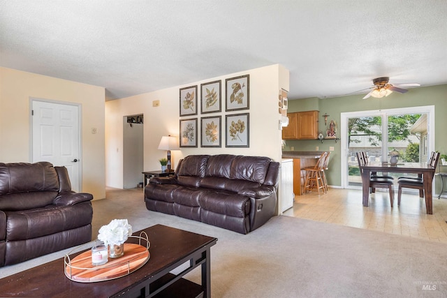 230 Sage St, Kimberly, ID 83341 - living area with light carpet, a ceiling fan, and a textured ceiling
