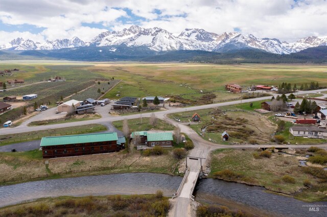 130 Valley Creek Rd, Stanley, ID 83278 - aerial overview of property's location featuring a mountainous background and rural landscape