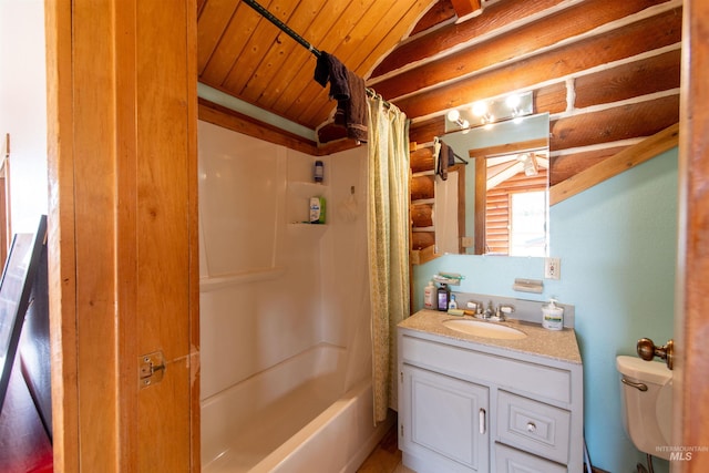 130 Valley Creek Rd, Stanley, ID 83278 - full bath featuring wooden ceiling, log walls, toilet, vanity, and shower / bathtub combination with curtain