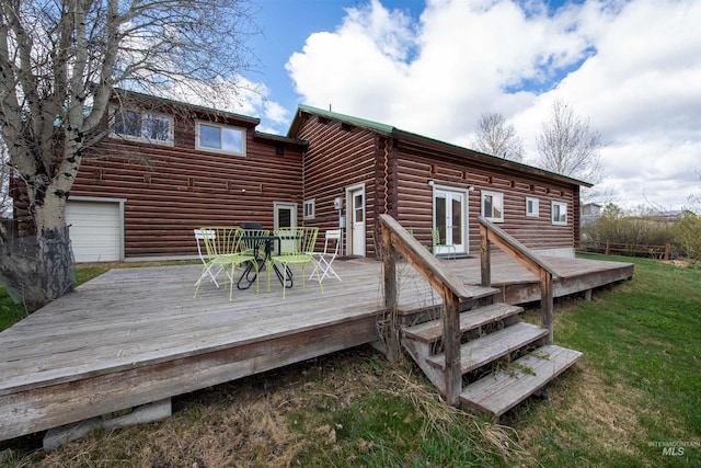 130 Valley Creek Rd, Stanley, ID 83278 - back of property featuring a deck, log siding, and a yard