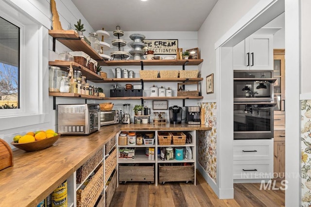 storage area featuring a toaster