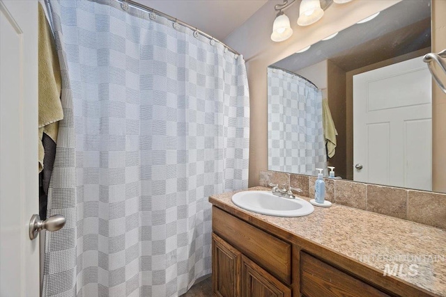 full bathroom with vanity