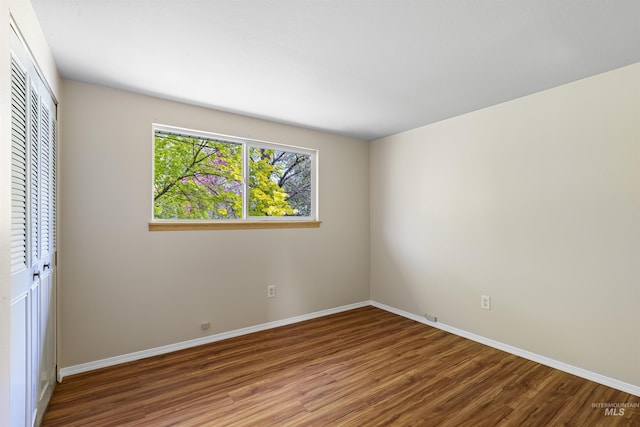 478AND716 Three Bear Rd, Kendrick, ID 83537 - unfurnished bedroom featuring wood finished floors, a closet, and baseboards