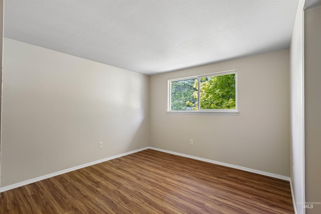 478AND716 Three Bear Rd, Kendrick, ID 83537 - spare room featuring wood finished floors and baseboards