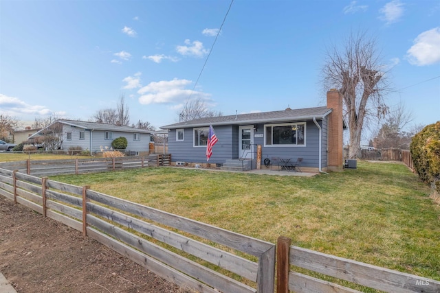 ranch-style home with a front yard