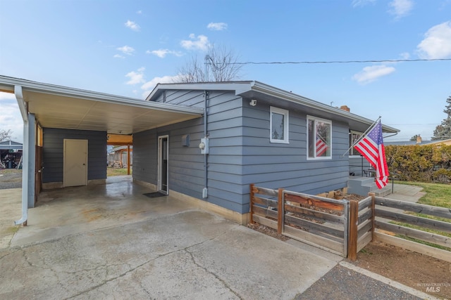 view of front of house with a carport