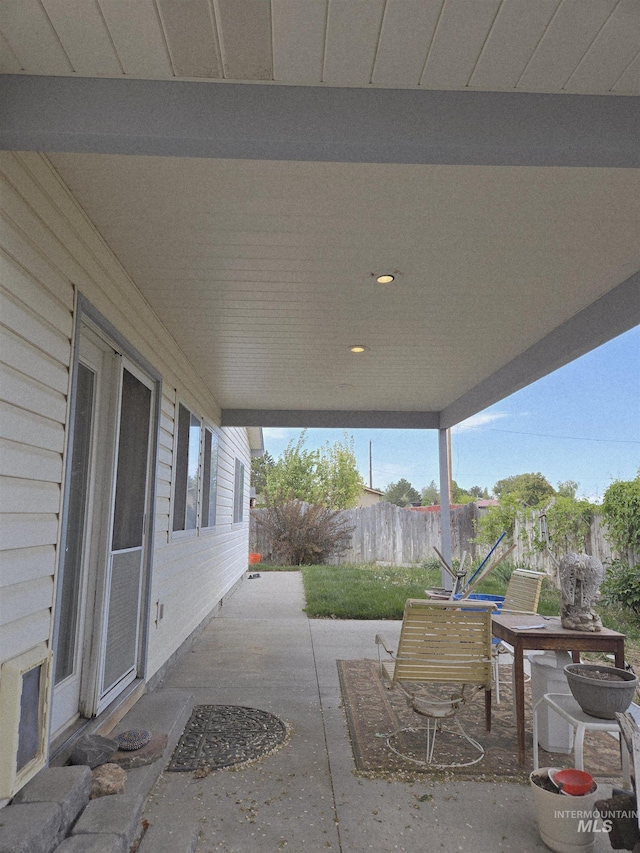 view of patio with fence