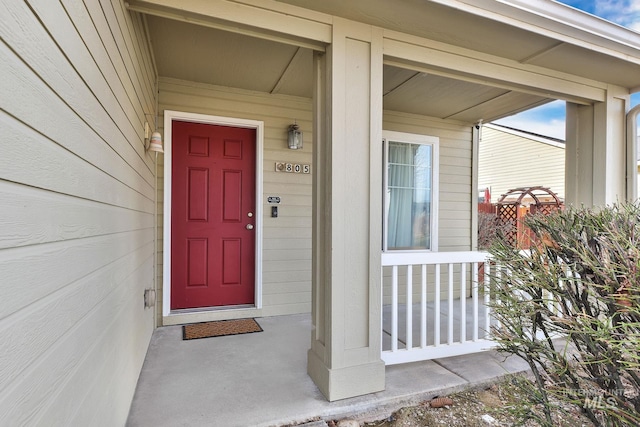 entrance to property with a porch