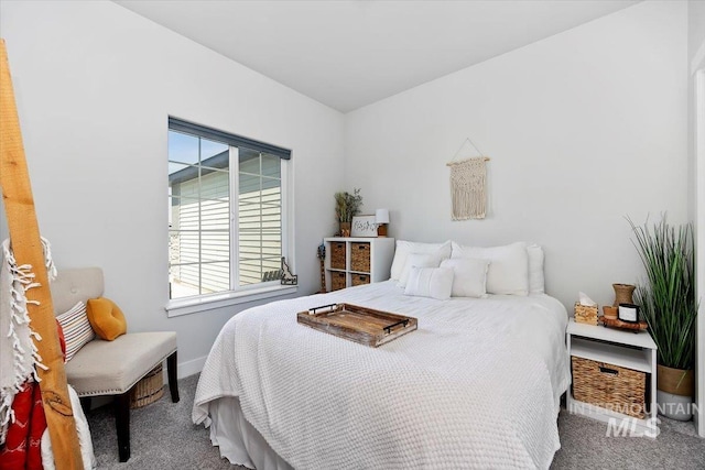 bedroom featuring carpet