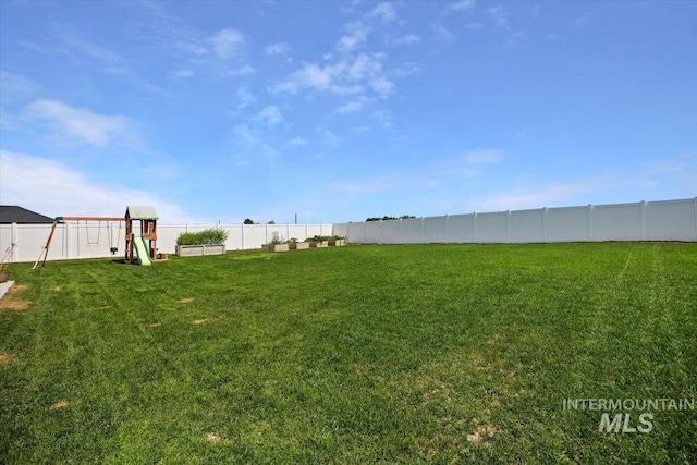 view of yard featuring a playground