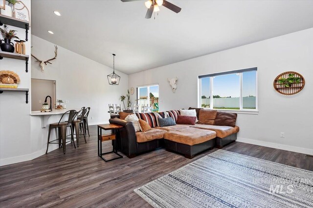 1418 N Birch St, Jerome, ID 83301 - living room with ceiling fan, dark wood finished floors, baseboards, recessed lighting, and high vaulted ceiling