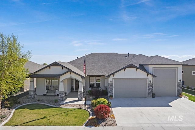 12225 W Indus Dr, Star, ID 83669 - ranch-style house with roof with shingles, a front lawn, driveway, an attached garage, and stucco siding
