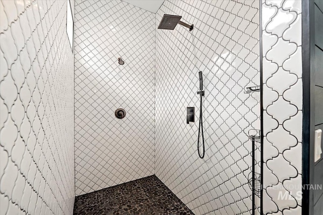 12225 W Indus Dr, Star, ID 83669 - full bathroom with a tile shower