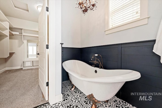 12225 W Indus Dr, Star, ID 83669 - full bath featuring wainscoting and a freestanding tub