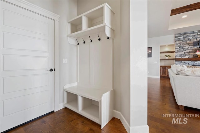 12225 W Indus Dr, Star, ID 83669 - mudroom with baseboards, dark wood-style flooring, and built in features