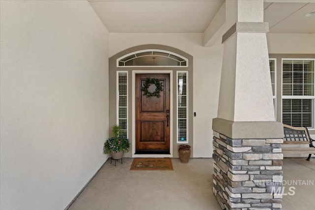 12225 W Indus Dr, Star, ID 83669 - doorway to property with stucco siding