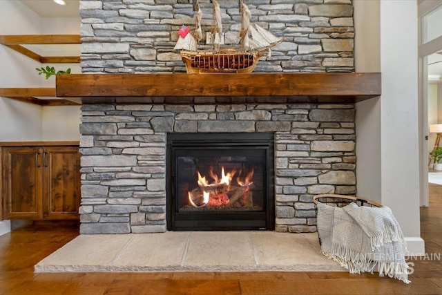 12225 W Indus Dr, Star, ID 83669 - room details featuring wood finished floors and a fireplace