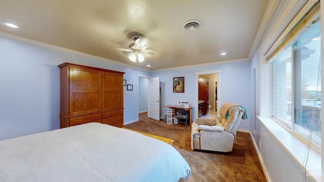 bedroom with baseboards, dark colored carpet, and visible vents