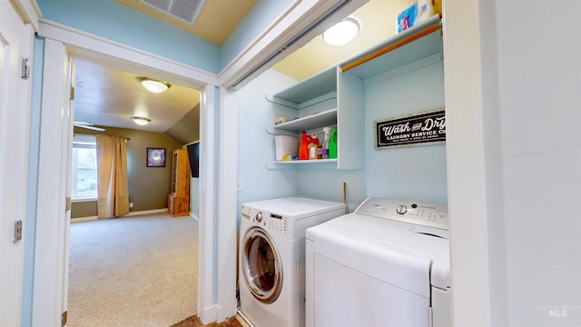 laundry room with washer and dryer, laundry area, visible vents, and carpet
