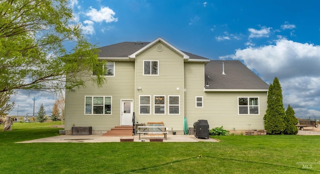 back of property with a patio, central AC unit, a lawn, and entry steps