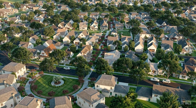 birds eye view of property with a residential view