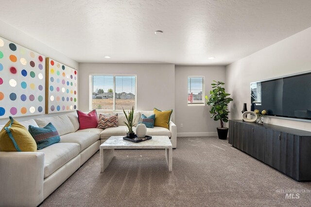 1210 Stirling Meadows Ct, Middleton, ID 83644 - living room with light colored carpet, plenty of natural light, baseboards, and recessed lighting
