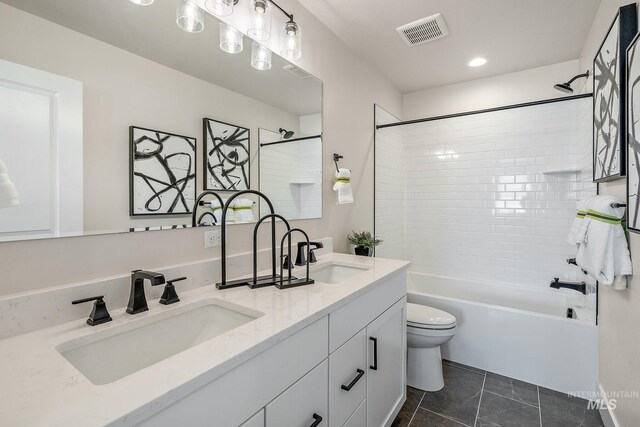 1210 Stirling Meadows Ct, Middleton, ID 83644 - bathroom featuring toilet, double vanity, shower / bath combination, and recessed lighting