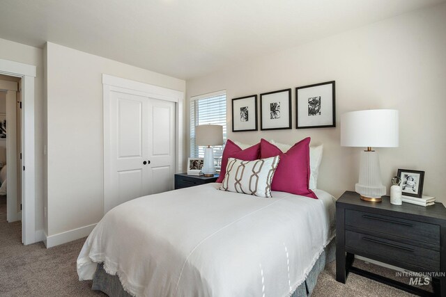 1210 Stirling Meadows Ct, Middleton, ID 83644 - bedroom with carpet floors, a closet, and baseboards