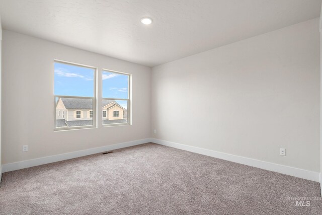 6080 N Senita Hills Ave, Meridian, ID 83646 - carpeted empty room featuring baseboards