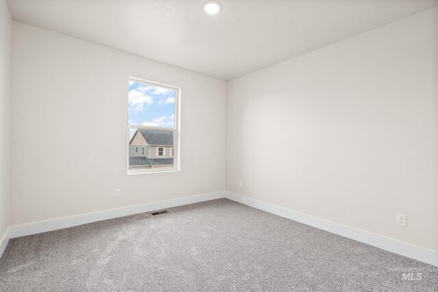 6080 N Senita Hills Ave, Meridian, ID 83646 - carpeted spare room with baseboards and recessed lighting